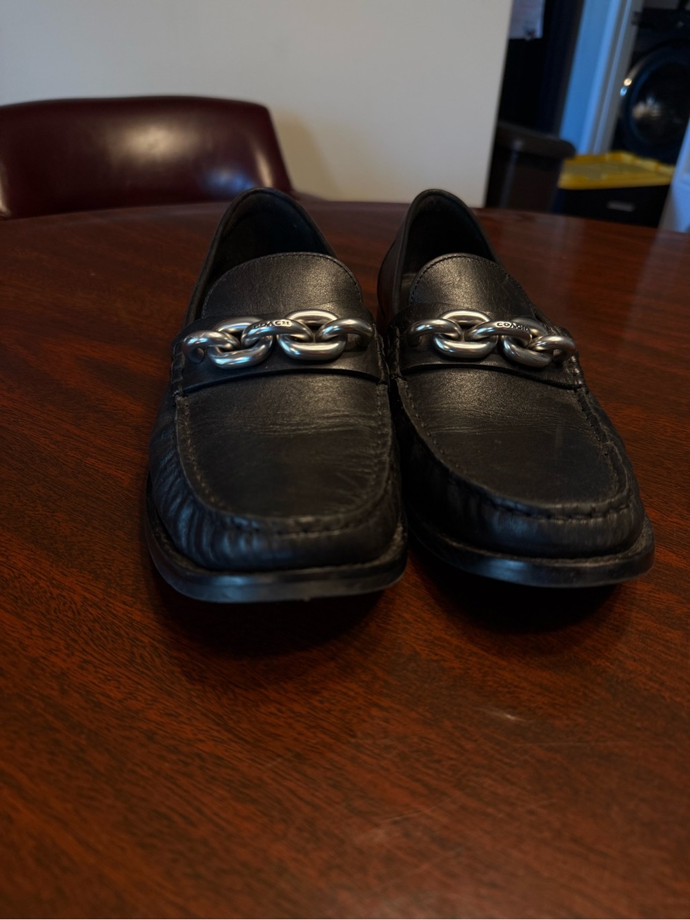 Coach Black Leather Loafers with Silver Chain Accent